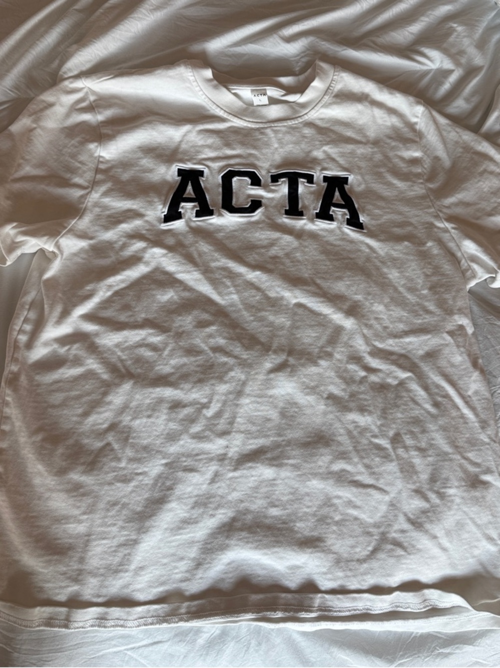 Acta shirt